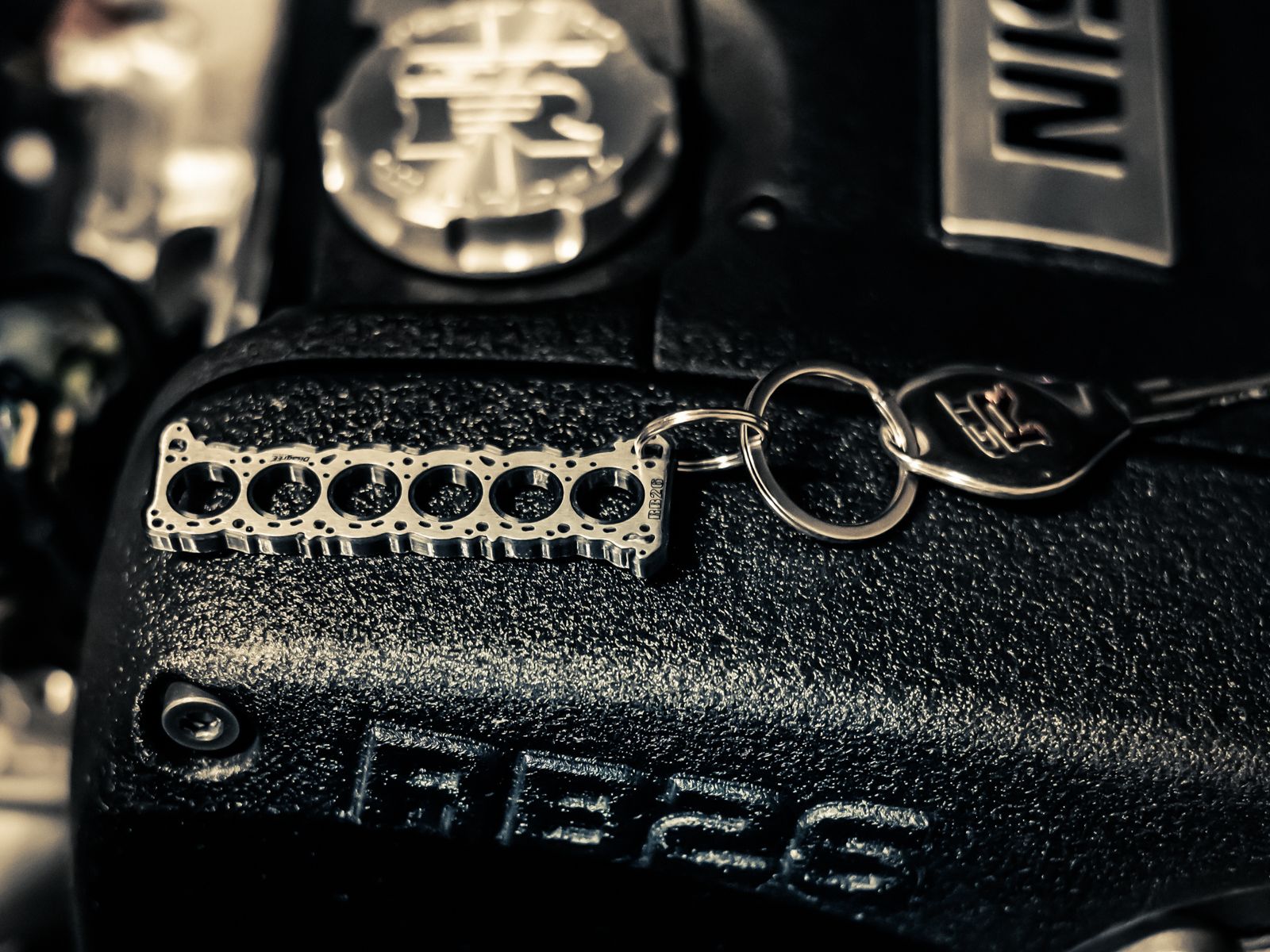 Miniatur einer Kopfdichtung für Nissan RB 20 / 25 / 26 DisagrEE