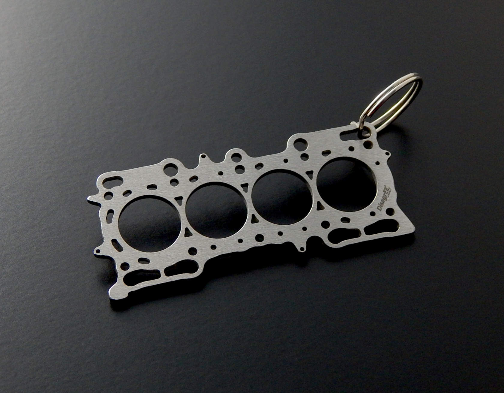 Miniatur einer Kopfdichtung für Honda H22 / H23 DisagrEE