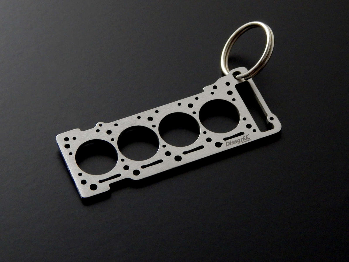 Miniatur einer Kopfdichtung für Mercedes OM 611 - DisagrEE - keychain - Schlüsselanhänger