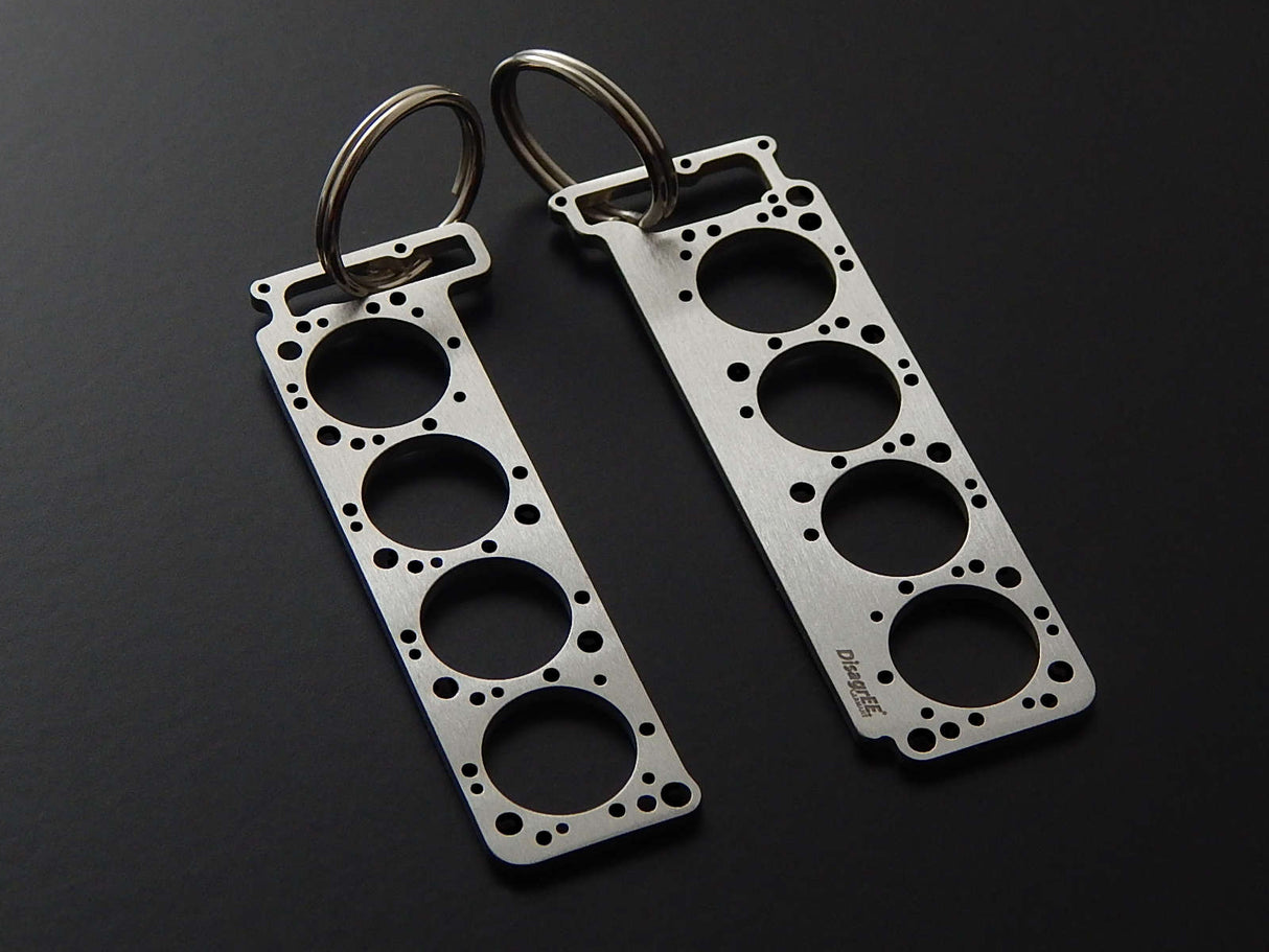 Miniatur einer Kopfdichtung für Mercedes M116 / M117 - DisagrEE - keychain - Schlüsselanhänger