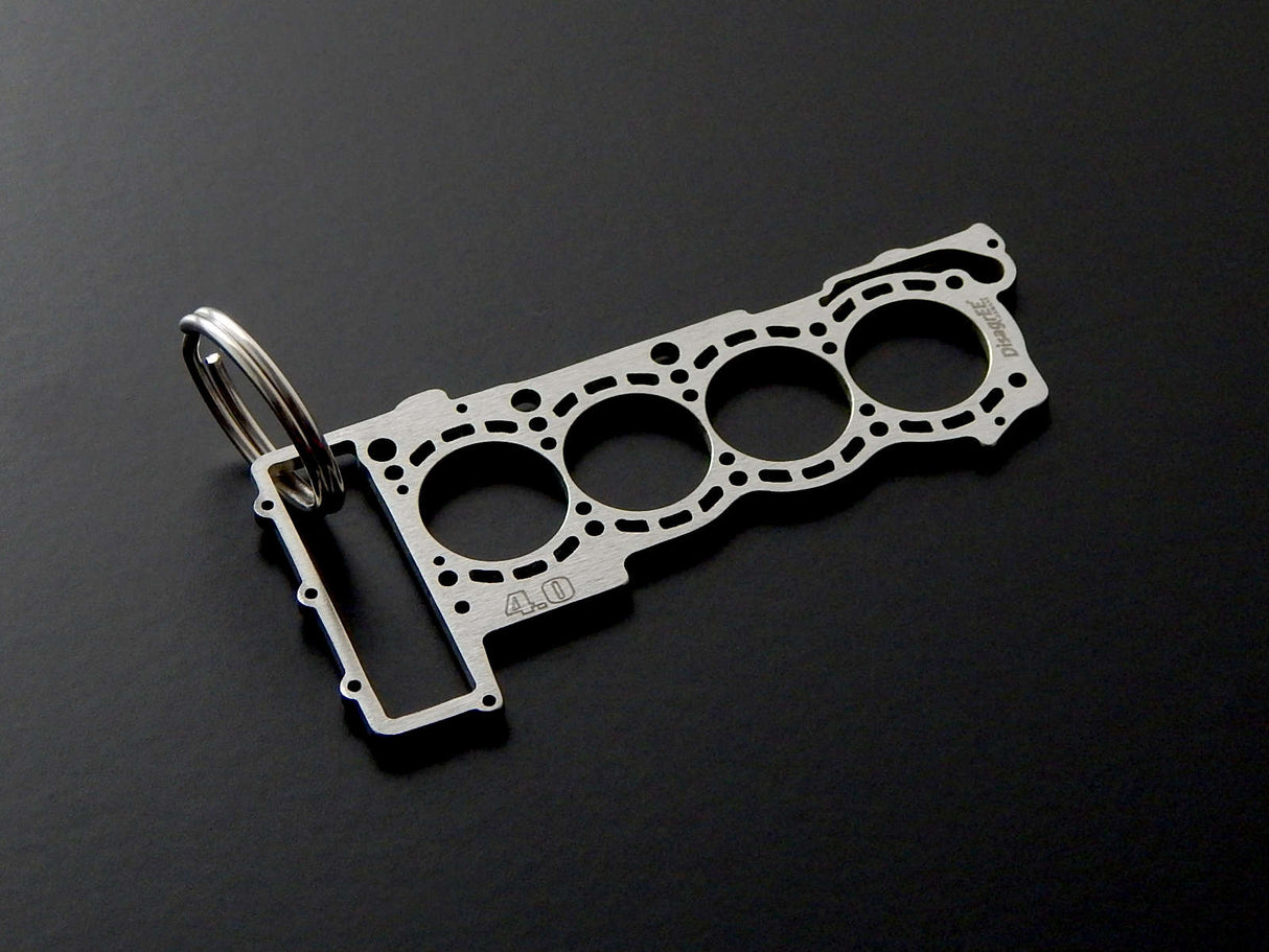 Miniatur einer Kopfdichtung für Audi 4,0 TFSI EA824 - DisagrEE - keychain - Schlüsselanhänger