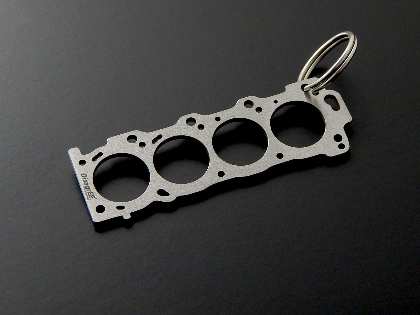 Miniatur einer Kopfdichtung für Toyota 2UZ-FE - DisagrEE - keychain - Schlüsselanhänger
