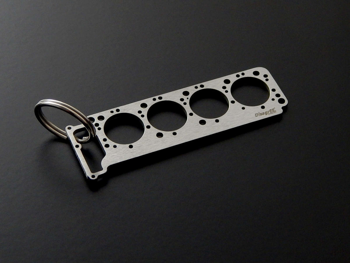 Miniatur einer Kopfdichtung für Mercedes M116 / M117 - DisagrEE - keychain - Schlüsselanhänger
