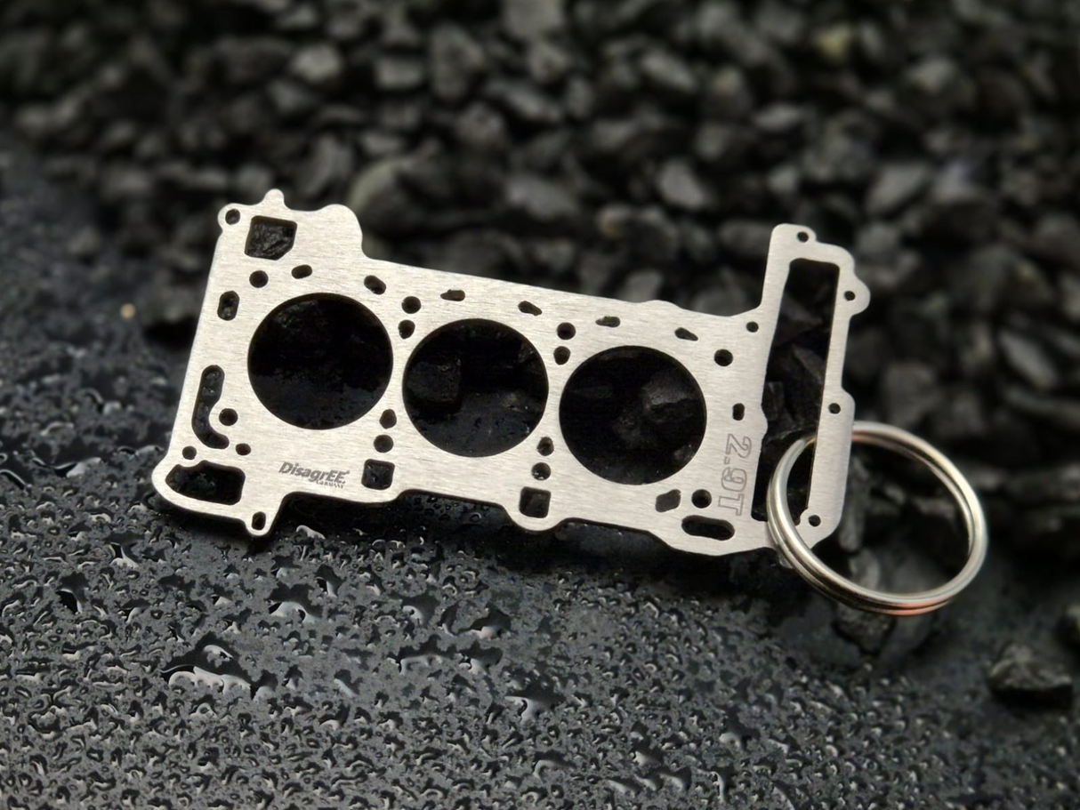 keychain - Schlüsselanhänger - Miniatur einer Kopfdichtung für Audi/Porsche 2.9 TFSI BiTurbo EA839 - DisagrEE Germany