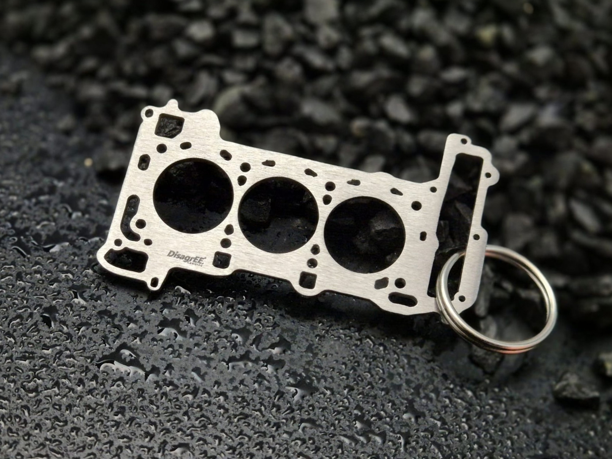 keychain - Schlüsselanhänger - Miniatur einer Kopfdichtung für Audi/Porsche 2.9 TFSI BiTurbo EA839 - DisagrEE Germany