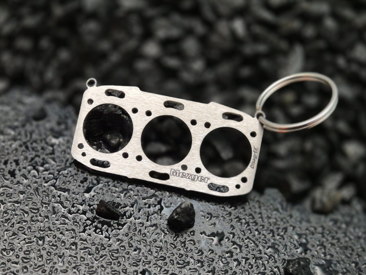 Miniatur einer Kopfdichtung für Porsche M96.7x/M97.7x - "Mezger Motor" DisagrEE
