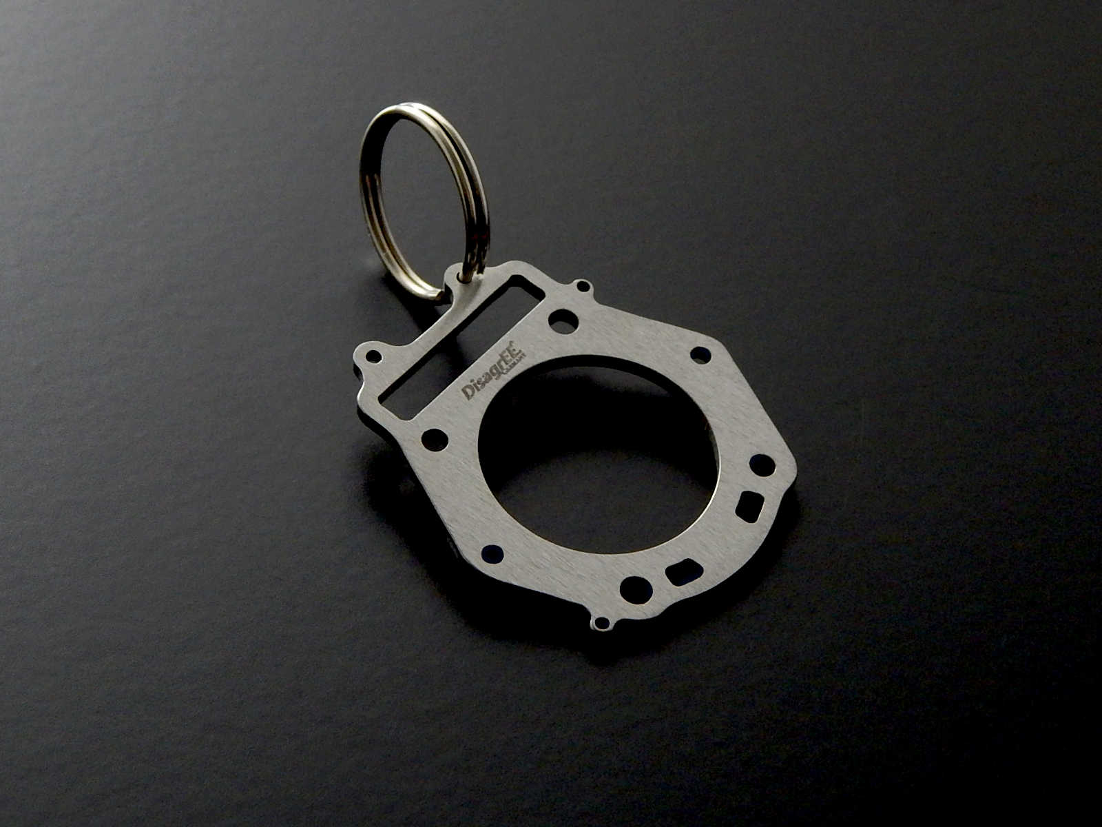 Miniatur einer Kopfdichtung für Suzuki DR 650 SP46 - DisagrEE - keychain - Schlüsselanhänger