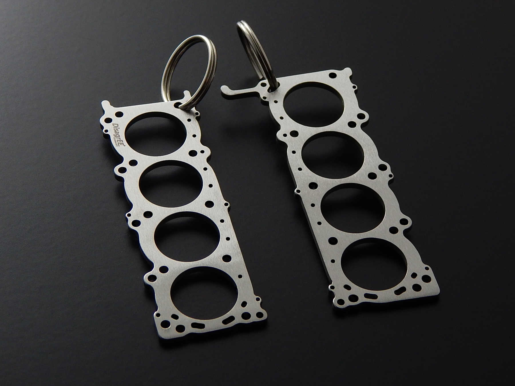 Miniatur einer Kopfdichtung für Nissan VK56DE - DisagrEE - keychain - Schlüsselanhänger