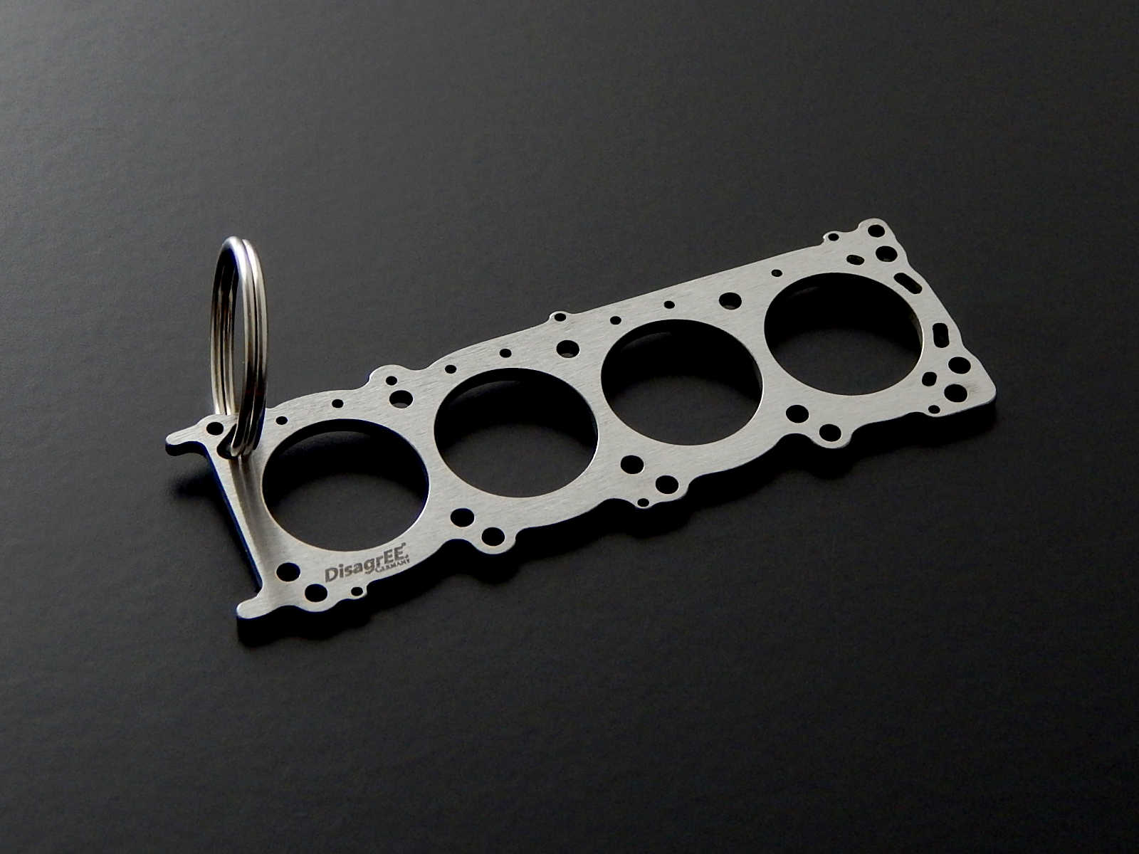 Miniatur einer Kopfdichtung für Nissan VK56DE - DisagrEE - keychain - Schlüsselanhänger