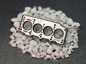 keychain - Schlüsselanhänger - Miniatur einer Kopfdichtung für Fiat 1.4 T-Jet / MultiAir - DisagrEE Germany
