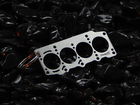 keychain - Schlüsselanhänger - Miniatur einer Kopfdichtung für Fiat 1.4 T-Jet / MultiAir - DisagrEE Germany