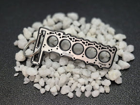 keychain - Schlüsselanhänger - Miniatur einer Kopfdichtung für Mercedes OM605 - DisagrEE Germany