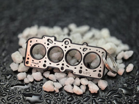 keychain - Schlüsselanhänger - Miniatur einer Kopfdichtung für VW/Audi 1,8T 20V - DisagrEE Germany