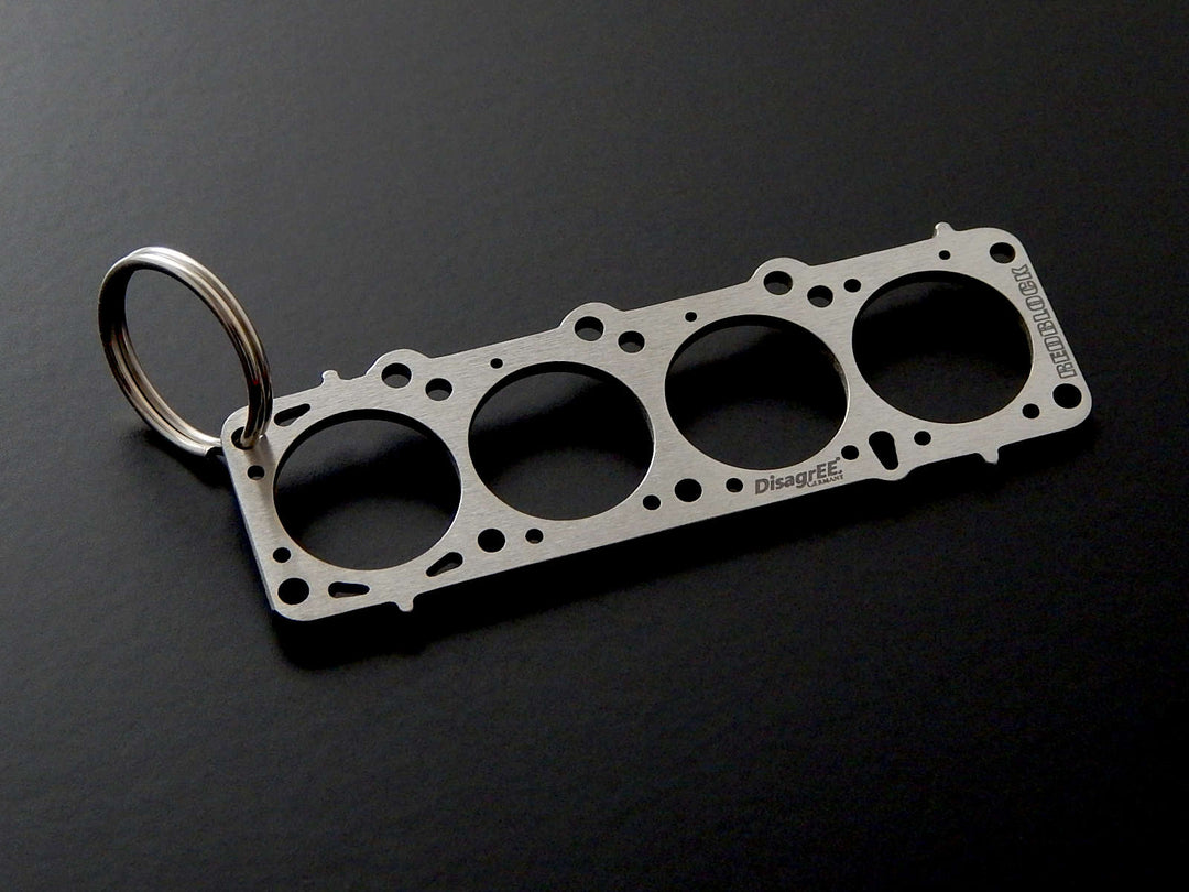 Miniatur einer Kopfdichtung für Volvo B21 (Redblock) Edelstahl  Schlüsselanhänger gebürstet – DisagrEE