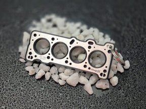 keychain - Schlüsselanhänger - Miniatur einer Kopfdichtung für Mazda B Motor (B6 / B8 / BP) - DisagrEE Germany