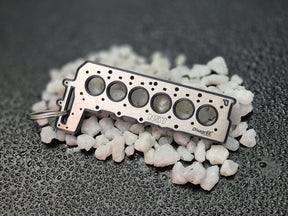 keychain - Schlüsselanhänger - Miniatur einer Kopfdichtung für BMW N57 - DisagrEE Germany