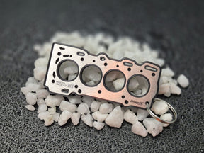 keychain - Schlüsselanhänger - Miniatur einer Kopfdichtung für Toyota 2ZZ-GE - DisagrEE Germany