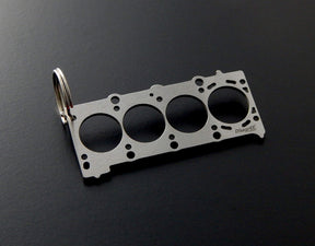 keychain - Schlüsselanhänger - Miniatur einer Kopfdichtung für BMW M42 / M44 - DisagrEE Germany