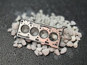 keychain - Schlüsselanhänger - Miniatur einer Kopfdichtung für Mitsubishi 4B11T - DisagrEE Germany