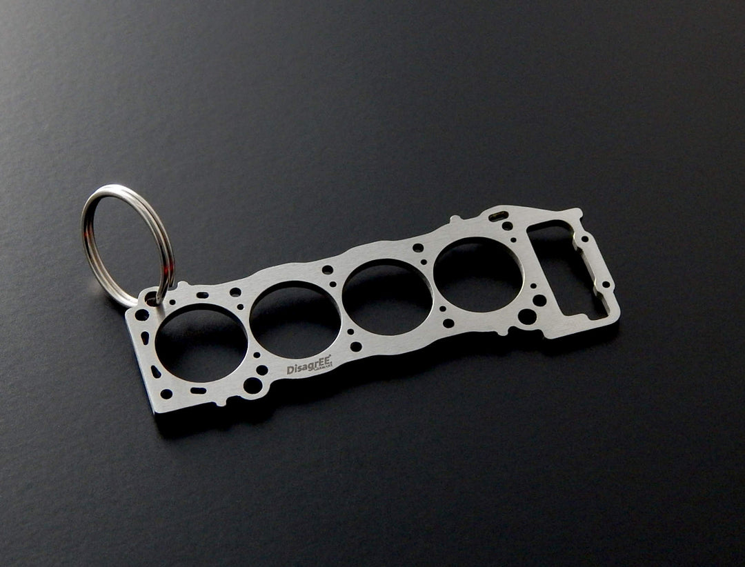 Miniatur einer Kopfdichtung für BMW S54Edelstahl Schlüsselanhänger  gebürstet – DisagrEE