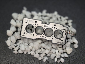 keychain - Schlüsselanhänger - Miniatur einer Kopfdichtung für PSA TU5 1,6 16V - DisagrEE Germany
