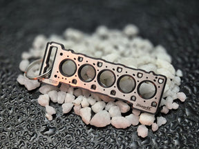 keychain - Schlüsselanhänger - Miniatur einer Kopfdichtung für Land Rover TD5 - DisagrEE Germany