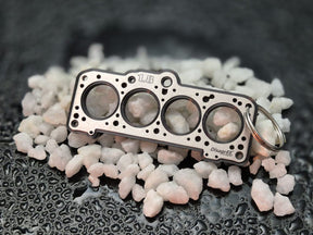 keychain - Schlüsselanhänger - Miniatur einer Kopfdichtung für VAG 1,8-2,0 (EA827) - DisagrEE Germany