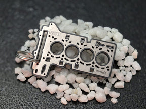 keychain - Schlüsselanhänger - Miniatur einer Kopfdichtung für BMW N20 - DisagrEE Germany