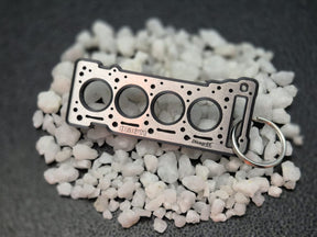 keychain - Schlüsselanhänger - Miniatur einer Kopfdichtung für Mercedes OM 611 - DisagrEE Germany