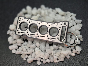 keychain - Schlüsselanhänger - Miniatur einer Kopfdichtung für Mercedes OM 646 - DisagrEE Germany