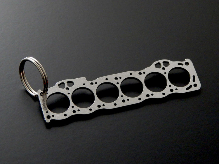 Miniatur einer Kopfdichtung für Toyota 1G-FE - DisagrEE - keychain - Schlüsselanhänger