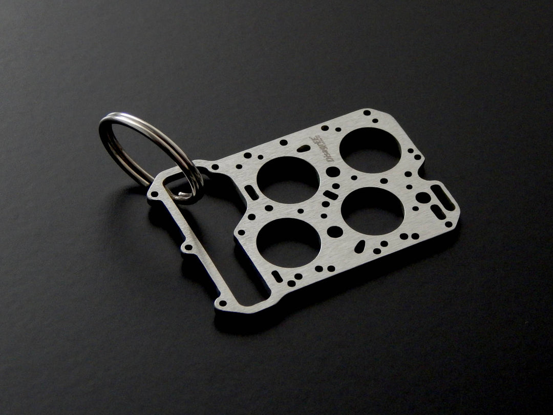 Miniatur einer Kopfdichtung für Lancia Fulvia V4 - DisagrEE - keychain - Schlüsselanhänger