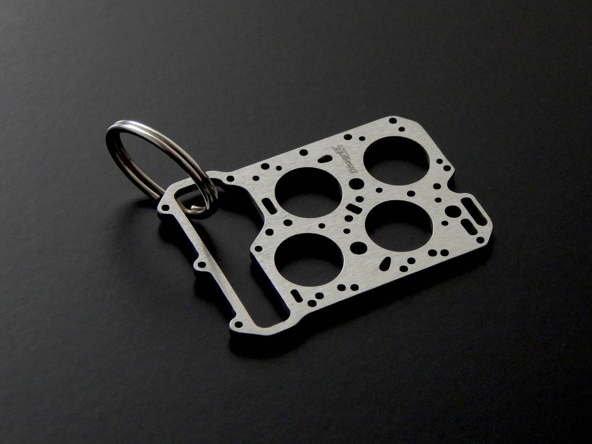 Miniatur einer Kopfdichtung für Lancia Fulvia V4 - DisagrEE - keychain - Schlüsselanhänger