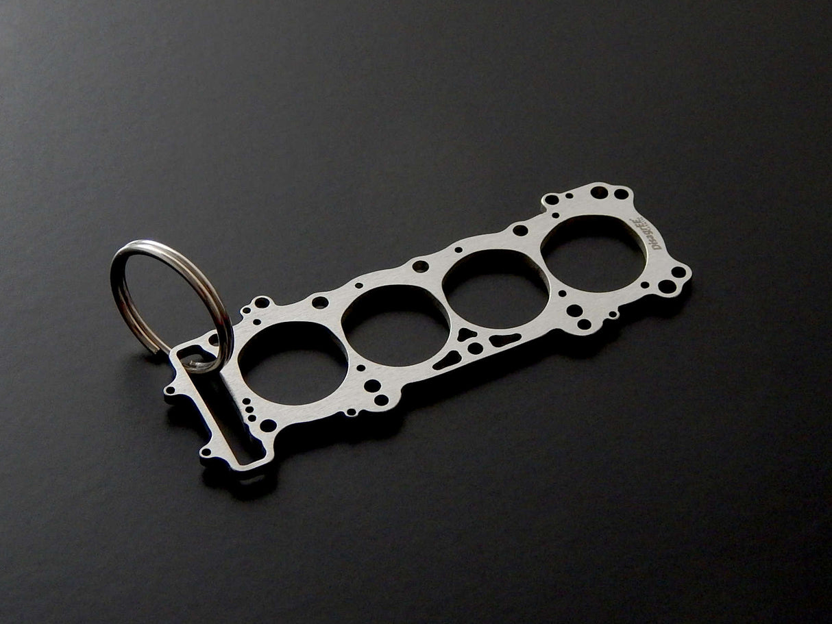 Miniatur einer Kopfdichtung für Honda CBR 1000 RR SC59 - DisagrEE - keychain - Schlüsselanhänger