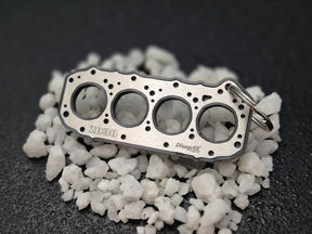 keychain - Schlüsselanhänger - Miniatur einer Kopfdichtung für Nissan ZD30 - DisagrEE Germany