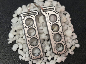 keychain - Schlüsselanhänger - Miniatur einer Kopfdichtung für Mercedes M119 - DisagrEE Germany