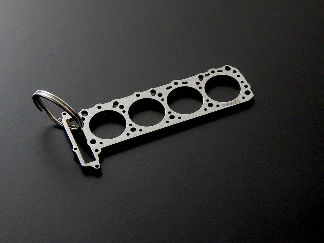 Miniatur einer Kopfdichtung für Mercedes M119 - DisagrEE - keychain - Schlüsselanhänger