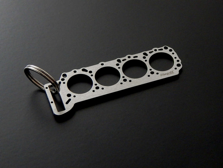 Miniatur einer Kopfdichtung für Mercedes M119 - DisagrEE - keychain - Schlüsselanhänger