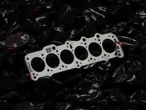 keychain - Schlüsselanhänger - Miniatur einer Kopfdichtung für VW/Volvo D24 / D24T - DisagrEE Germany