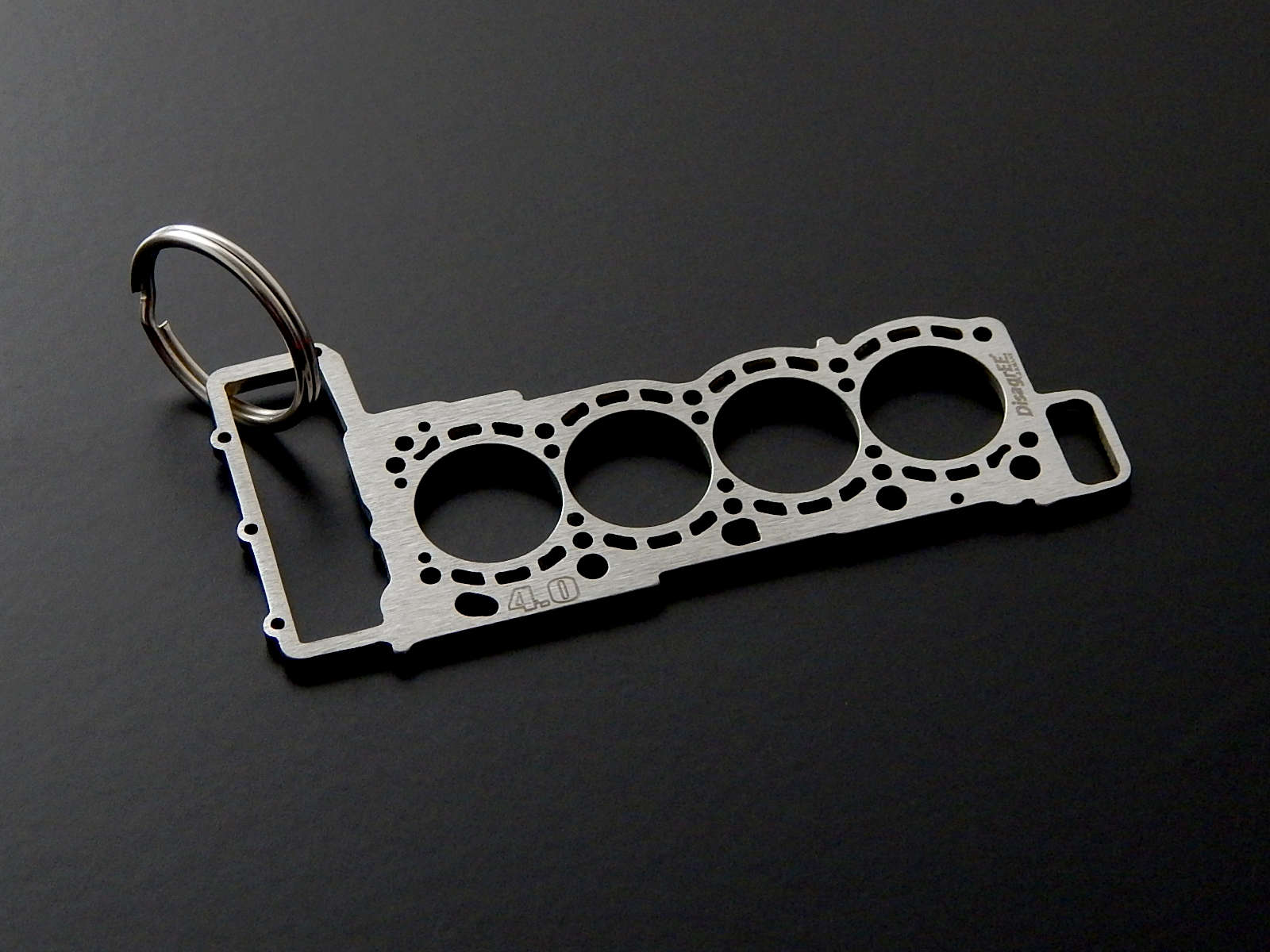 Miniatur einer Kopfdichtung für Audi 4,0 TFSI EA824 - DisagrEE - keychain - Schlüsselanhänger