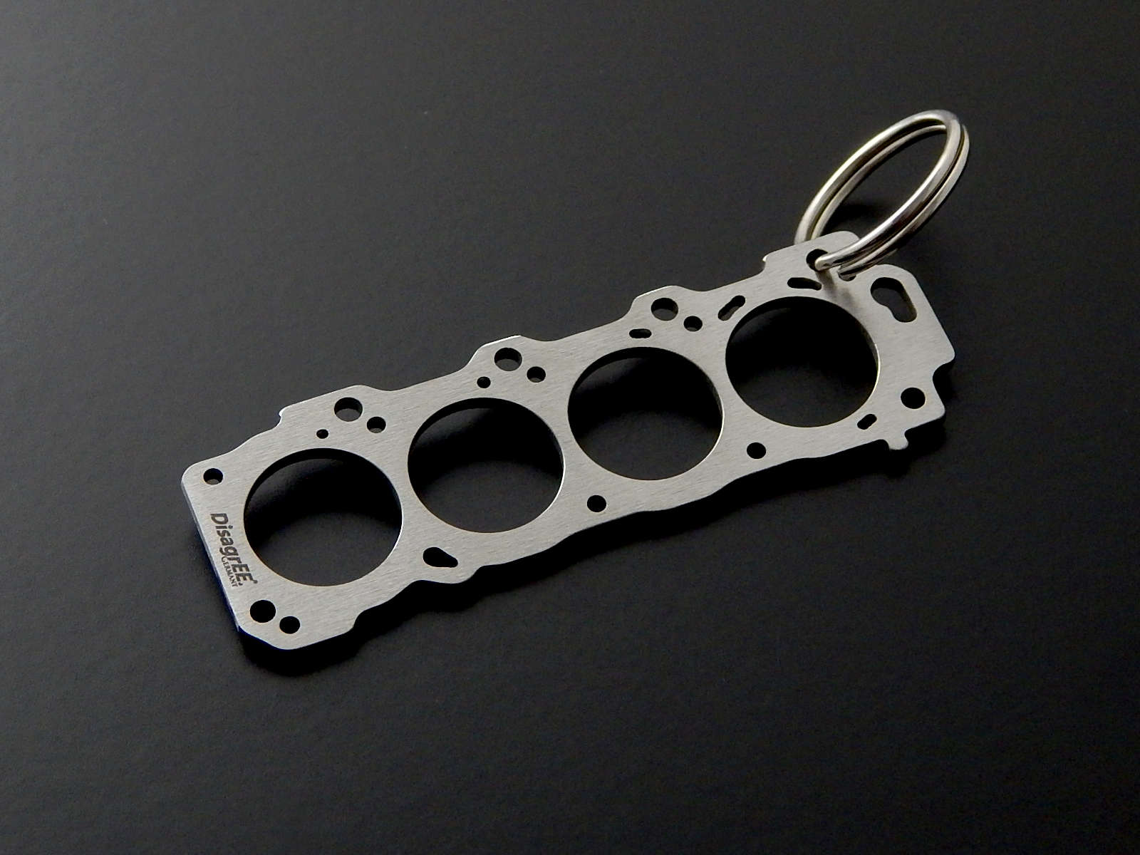 Miniatur einer Kopfdichtung für Toyota 2UZ-FE - DisagrEE - keychain - Schlüsselanhänger