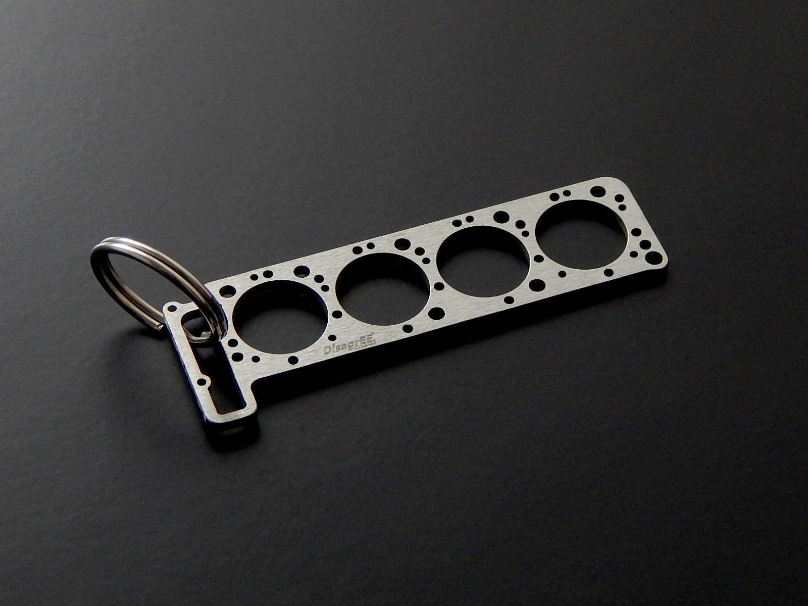 Miniatur einer Kopfdichtung für Mercedes M116 / M117 - DisagrEE - keychain - Schlüsselanhänger