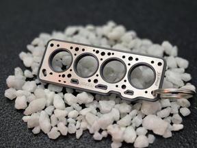 keychain - Schlüsselanhänger - Miniatur einer Kopfdichtung für VW EA111 1,3 / G40 - DisagrEE Germany