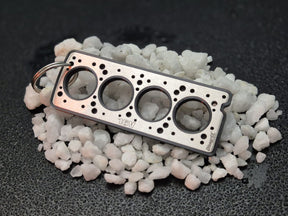 keychain - Schlüsselanhänger - Miniatur einer Kopfdichtung für Fiat / Lancia Twin Cam 2.0 Turbo - DisagrEE Germany