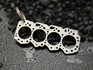 keychain - Schlüsselanhänger - Miniatur einer Kopfdichtung für Isuzu 4JJ - DisagrEE Germany