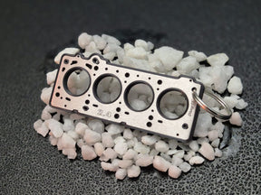 keychain - Schlüsselanhänger - Miniatur einer Kopfdichtung für Chrysler 2.4 EDZ / EDV / EDT - DisagrEE Germany