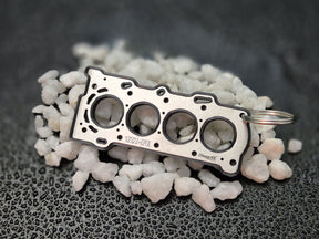 keychain - Schlüsselanhänger - Miniatur einer Kopfdichtung für Toyota 1ZZ-FE - DisagrEE Germany