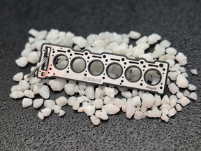 keychain - Schlüsselanhänger - Miniatur einer Kopfdichtung für Mercedes OM648 - DisagrEE Germany