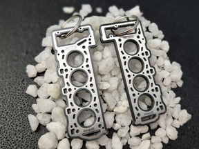 keychain - Schlüsselanhänger - Miniatur einer Kopfdichtung für Mercedes-AMG M178 - DisagrEE Germany