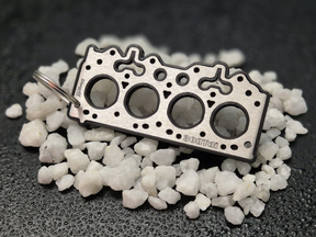 keychain - Schlüsselanhänger - Miniatur einer Kopfdichtung für Land Rover 300Tdi - DisagrEE Germany